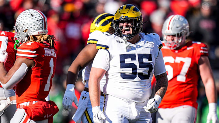 Michigan defensive lineman Mason Graham (55) celebrates a play against Ohio State during the second half at Ohio Stadium in Columbus, Ohio on Saturday, Nov. 30, 2024.