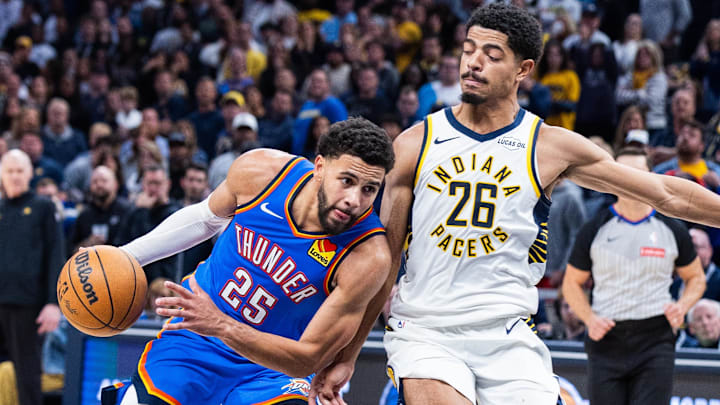 Oct 23, 2025; Indianapolis, Indiana, USA; Oklahoma City Thunder guard Ajay Mitchell (25) dribbles the ball while Indiana Pacers guard Ben Sheppard (26) defends in the second half at Gainbridge Fieldhouse. Mandatory Credit: Trevor Ruszkowski-Imagn Images Oct 23, 2025; Indianapolis, Indiana, USA; Oklahoma City Thunder guard Ajay Mitchell (25) dribbles the ball while Indiana Pacers guard Ben Sheppard (26) defends in the second half at Gainbridge Fieldhouse. Mandatory Credit: Trevor Ruszkowski-Imagn Images