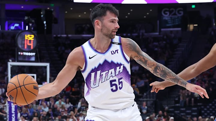 Mar 21, 2026; Salt Lake City, Utah, USA; Utah Jazz guard John Konchar (55) looks to pass against the Philadelphia 76ers during the second half at Delta Center. Mandatory Credit: Rob Gray-Imagn Images
