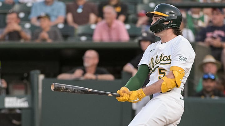 Jun 4, 2025; West Sacramento, California, USA; Athletics shortstop Jacob Wilson (5) hits a single Jun 4, 2025; West Sacramento, California, USA; Athletics shortstop Jacob Wilson (5) hits a single
