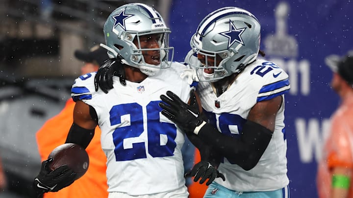 Sep 10, 2023; East Rutherford, New Jersey, USA; Dallas Cowboys cornerback DaRon Bland (26) celebrates his touchdown against the New York Giants during the first half at MetLife Stadium. Mandatory Credit: Ed Mulholland-Imagn Images