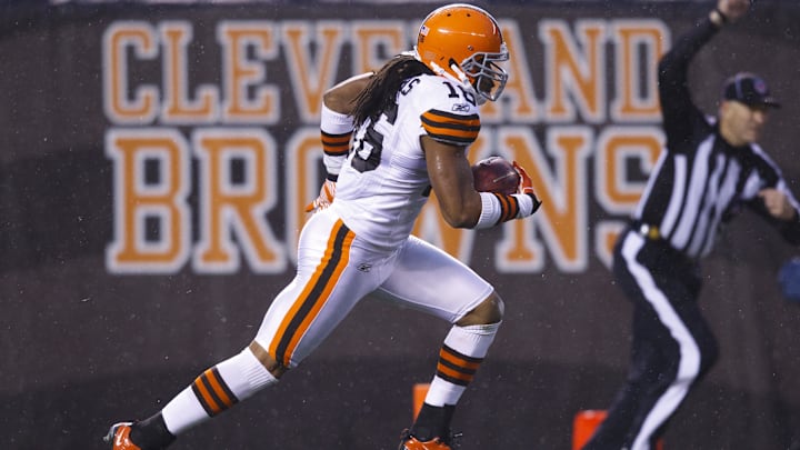 Dec 4, 2011; Cleveland, OH, USA; Cleveland Browns wide receiver Josh Cribbs (16) runs the ball against the Baltimore Ravens at Cleveland Browns Stadium. Mandatory Credit: Rick Osentoski-Imagn Images