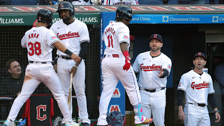 Guardians manager Stephen Vogt congratulates José Ramírez (11) after his two-run homer during the fifth inning of the home opener against the Chicago White Sox, Monday, April 8, 2024.