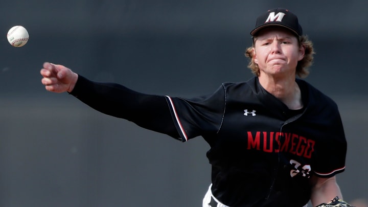 Muskego High School's Tyson Grulkowski (22) pitches versus Sun Prairie East in a WIAA Division 1 quarterfinal game on June 16, 2025.