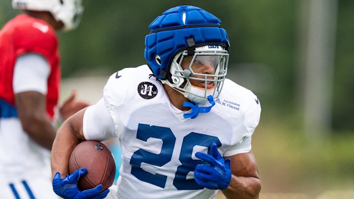 Indianapolis Colts running back Jonathan Taylor (28) takes off on a run Monday, July 28, 2025, during training camp held at Grand Park in Westfield.