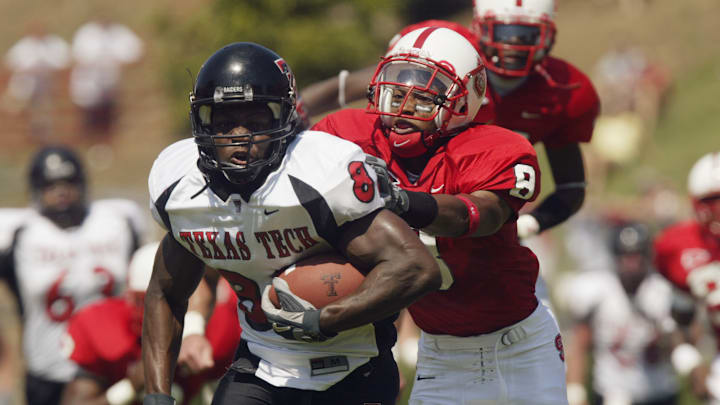 Carlos Francis runs by defense