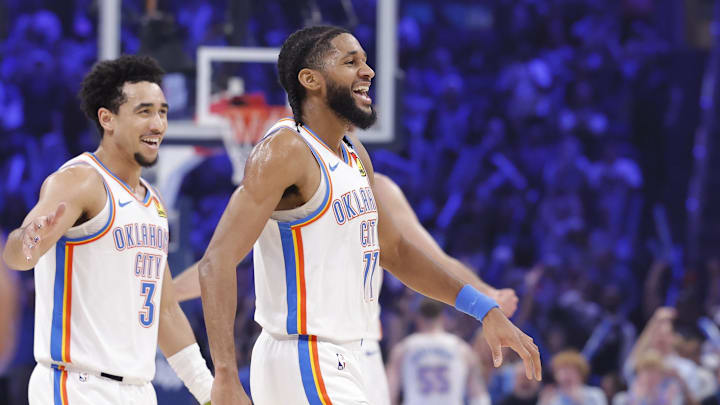 Feb 7, 2026; Oklahoma City, Oklahoma, USA; Oklahoma City Thunder guard Isaiah Joe (11) smiles after scoring against the Houston Rockets during the first half at Paycom Center. Mandatory Credit: Alonzo Adams-Imagn Images