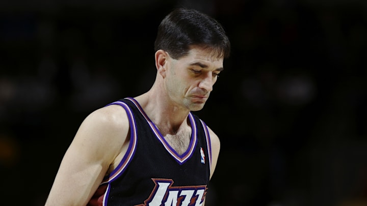 John Stockton looks on