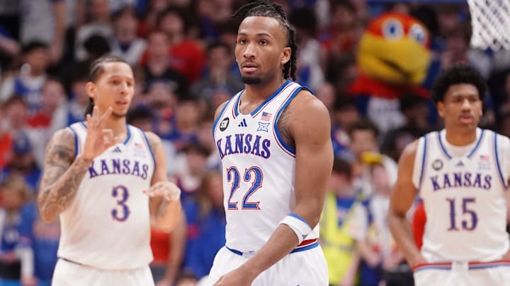 Kansas Jayhawks guard Darryn Peterson (22) enters the court with Kansas Jayhawks guard Tre White (3) and Kansas Jayhawks forward Bryson Tiller (15) during the game against Houston Cougars inside Allen Fieldhouse on Monday, Feb. 23, 2026.