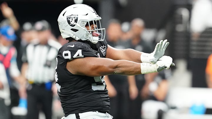 Sep 22, 2024; Paradise, Nevada, USA; Las Vegas Raiders defensive tackle Christian Wilkins (94) celebrates after getting a sack against the Carolina Panthers during the second quarter at Allegiant Stadium. Mandatory Credit: Stephen R. Sylvanie-Imagn Images Sep 22, 2024; Paradise, Nevada, USA; Las Vegas Raiders defensive tackle Christian Wilkins (94) celebrates after getting a sack against the Carolina Panthers during the second quarter at Allegiant Stadium. Mandatory Credit: Stephen R. Sylvanie-Imagn Images