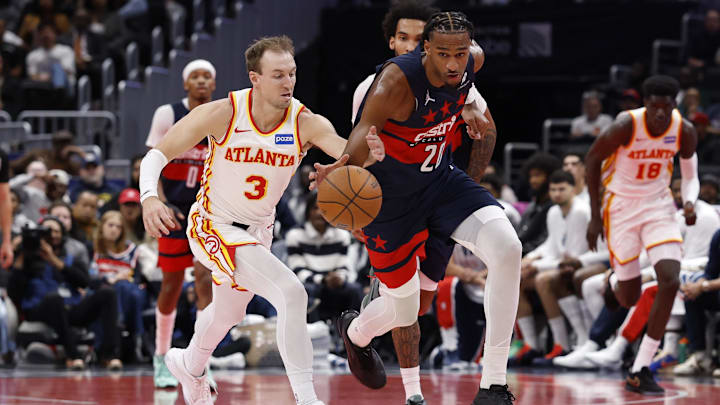 Nov 25, 2025; Washington, District of Columbia, USA; Washington Wizards center Alex Sarr (20) steals the ball from Atlanta Hawks guard Luke Kennard (3) in the second half at Capital One Arena. Mandatory Credit: Geoff Burke-Imagn Images Nov 25, 2025; Washington, District of Columbia, USA; Washington Wizards center Alex Sarr (20) steals the ball from Atlanta Hawks guard Luke Kennard (3) in the second half at Capital One Arena. Mandatory Credit: Geoff Burke-Imagn Images