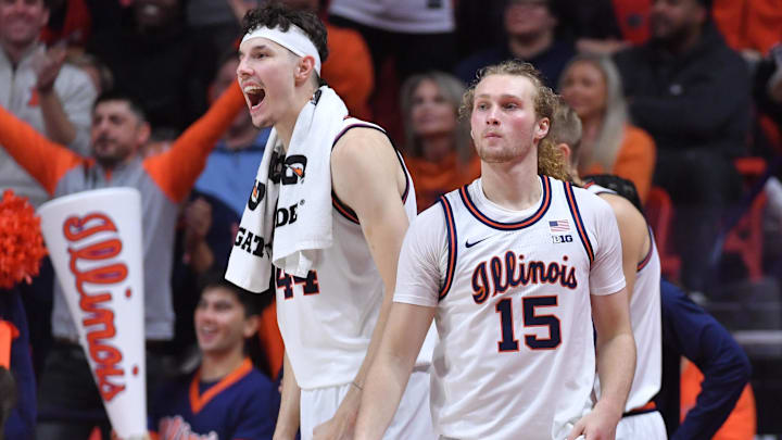 Nov 11, 2025; Champaign, Illinois, USA; Illinois Fighting Illini forward Zvonimir Ivisic (44) and teammate Jake Davis (15) react during the second half against the Texas Tech Red Raiders at State Farm Center. Mandatory Credit: Ron Johnson-Imagn Images