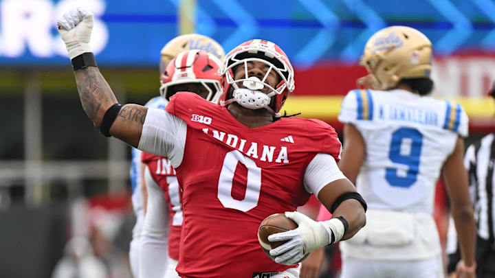 Oct 25, 2025; Bloomington, Indiana, USA; Indiana Hoosiers defensive lineman Hosea Wheeler (0) celebrates after recovering a fumble during the first half against the UCLA Bruins at Memorial Stadium. Mandatory Credit: Robert Goddin-Imagn Images Oct 25, 2025; Bloomington, Indiana, USA; Indiana Hoosiers defensive lineman Hosea Wheeler (0) celebrates after recovering a fumble during the first half against the UCLA Bruins at Memorial Stadium. Mandatory Credit: Robert Goddin-Imagn Images