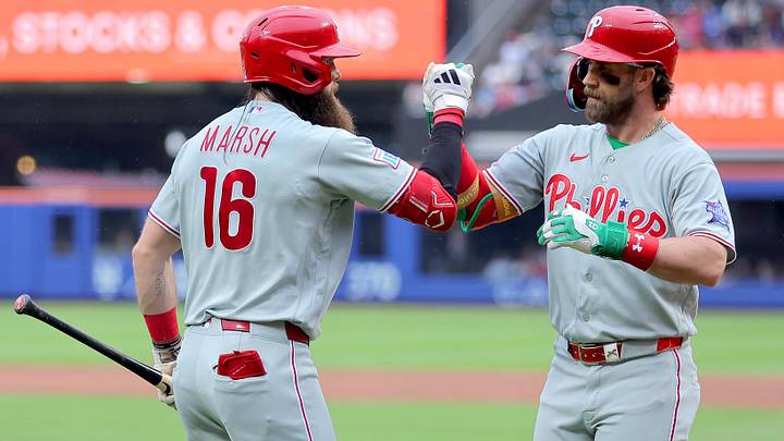 Jun 27, 2026; New York City, New York, USA; Philadelphia Phillies first baseman Bryce Harper (3) celebrates his two run home run against the New York Mets with on deck hitter Brandon Marsh (16) during the third inning at Citi Field.