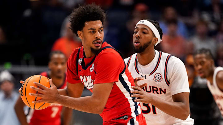 Mississippi forward Jaemyn Brakefield (4) looks for an opening past Auburn forward Chaney Johnson (31) during the second half of a Southeastern Conference tournament quarterfinal game at Bridgestone Arena in Nashville, Tenn., Friday, March 14, 2025. Mississippi forward Jaemyn Brakefield (4) looks for an opening past Auburn forward Chaney Johnson (31) during the second half of a Southeastern Conference tournament quarterfinal game at Bridgestone Arena in Nashville, Tenn., Friday, March 14, 2025.