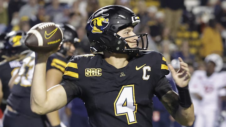Sep 19, 2024; Boone, North Carolina, USA;  Appalachian State Mountaineers quarterback Joey Aguilar (4) throws a pass against the South Alabama Jaguars during the second quarter at Kidd Brewer Stadium. Mandatory Credit: Reinhold Matay-Imagn Images