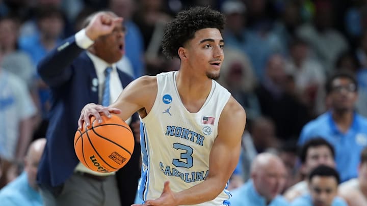 Mar 19, 2026; Greenville, SC, USA; North Carolina Tar Heels guard Derek Dixon (3) dribbles the ball against the VCU Rams in the first half of a first round game of the men's 2026 NCAA Tournament at Bon Secours Wellness Arena. Mandatory Credit: Jim Dedmon-Imagn Images