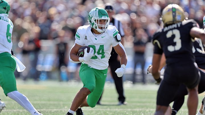 West Point, New York, USA; North Texas Mean Green running back Caleb Hawkins (24) runs for a touchdown against the Army Black Knights during the second half at Michie Stadium.