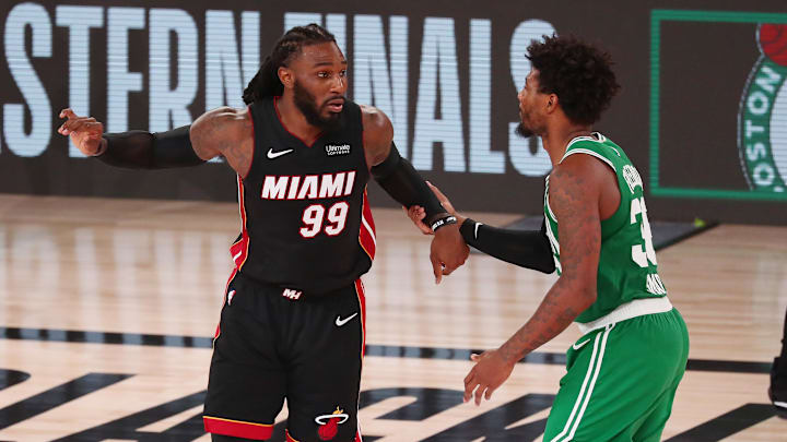 Sep 19, 2020; Lake Buena Vista, Florida, USA; Miami Heat forward Jae Crowder (99) reacts with Boston Celtics guard Marcus Smart (36) react after a three point basket by Crowder during the second half of game three of the Eastern Conference Finals of the 2020 NBA Playoffs at ESPN Wide World of Sports Complex. Mandatory Credit: Kim Klement-Imagn Images