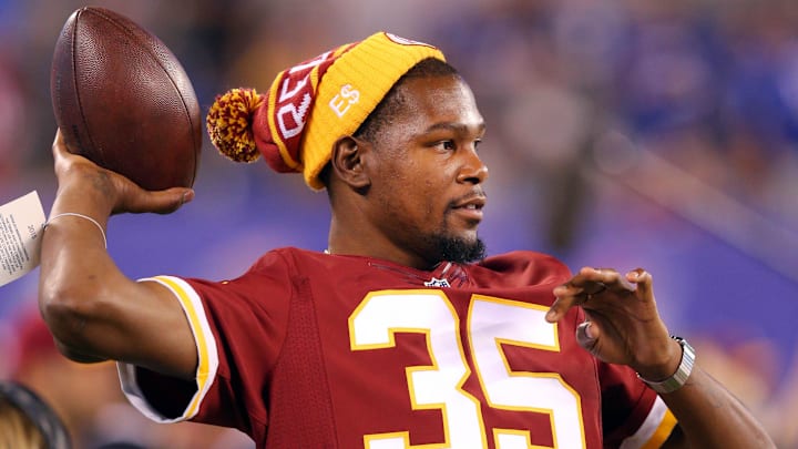 Sep 24, 2015; East Rutherford, NJ, USA; NBA player Kevin Durant on the Washington Redskins sideline before a game against the New York Giants at MetLife Stadium. Mandatory Credit: Brad Penner-Imagn Images