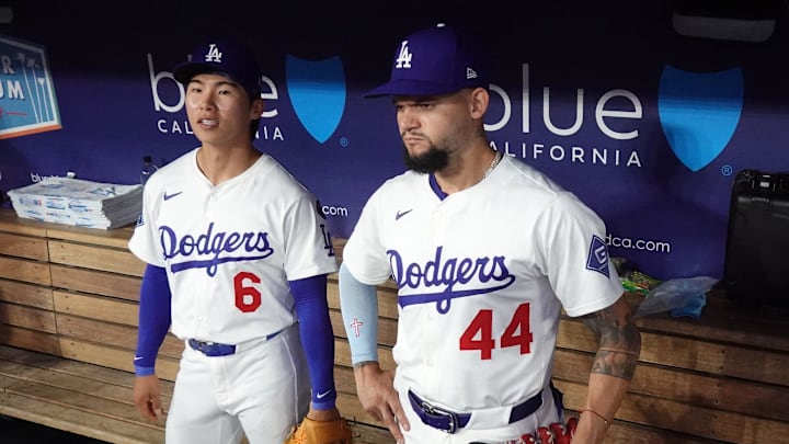 Sep 8, 2025; Los Angeles, California, USA; Los Angeles Dodgers second baseman Hyeseong Kim (6) and center fielder Andy Pages (44) watch from the dugout against the Colorado Rockies at Dodger Stadium. Mandatory Credit: Kirby Lee-Imagn Images