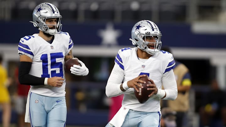 Aug 26, 2022; Arlington, Texas, USA;  Dallas Cowboys quarterback Dak Prescott (4) and quarterback Will Grier (15) throw passes during warmups before the game against the Seattle Seahawks at AT&T Stadium. Mandatory Credit: Tim Heitman-Imagn Images