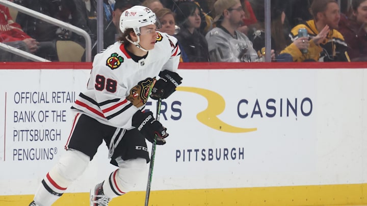 Apr 8, 2025; Pittsburgh, Pennsylvania, USA;  Chicago Blackhawks center Connor Bedard (98) skates with the puck against the Pittsburgh Penguins during the first period at PPG Paints Arena. Mandatory Credit: Charles LeClaire-Imagn Images