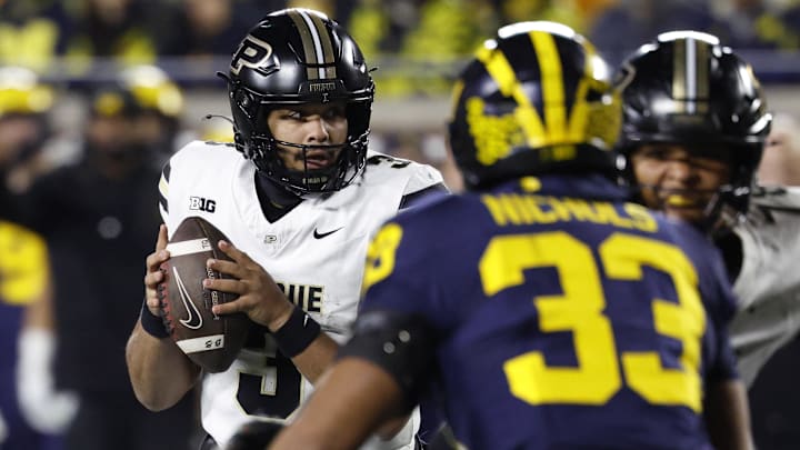 Purdue Boilermakers quarterback Malachi Singleton (3) looks to pass Purdue Boilermakers quarterback Malachi Singleton (3) looks to pass