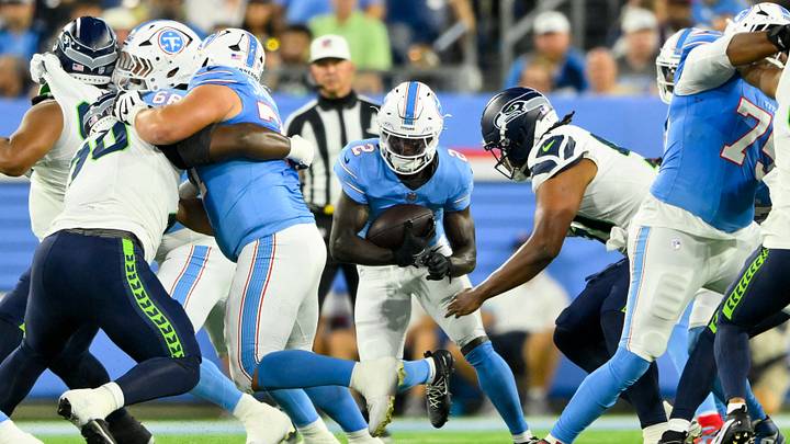 Aug 23, 2026; Nashville, Tennessee, USA;  Tennessee Titans running back Tyjae Spears (2) runs with the ball against the Seattle Seahawks during the first half at Nissan Stadium.  Mandatory Credit: Steve Roberts-Imagn Images