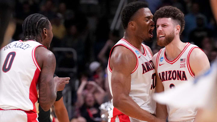 Arizona Wildcats forward Tobe Awaka (30) and guard Anthony Dell'Orso (3) celebrate during a NCAA Tournament game against the Purdue Boilermakers on Saturday, March 28, 2026 at SAP Center in San Jose, Calif. Purdue fell to Arizona 79-64.