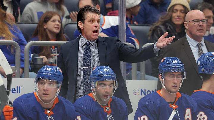 New York Islanders head coach Lane Lambert reacts as he coaches against the Pittsburgh Penguins.