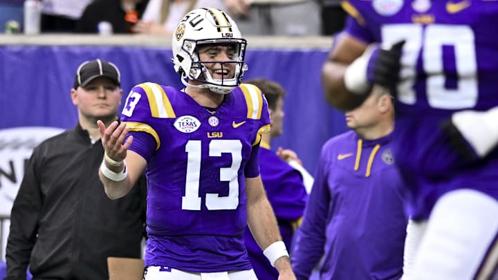 Dec 31, 2024; Houston, TX, USA; LSU Tigers quarterback Garrett Nussmeier (13) reacts after throwing a touchdown pass during the first half against the Baylor Bears at NRG Stadium. The Tigers defeat the Bears 44-31. Mandatory Credit: Maria Lysaker-Imagn Images Dec 31, 2024; Houston, TX, USA; LSU Tigers quarterback Garrett Nussmeier (13) reacts after throwing a touchdown pass during the first half against the Baylor Bears at NRG Stadium. The Tigers defeat the Bears 44-31. Mandatory Credit: Maria Lysaker-Imagn Images