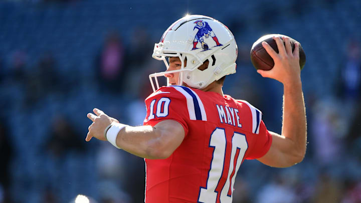 Dec 1, 2024; Foxborough, Massachusetts, USA;  New England Patriots quarterback Drake Maye (10) throws the ball during warmups prior to a game against the Indianapolis Colts at Gillette Stadium.