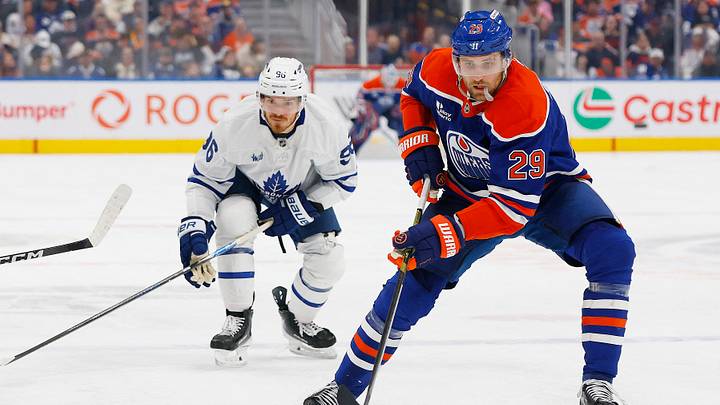 Oct 24, 2026; Edmonton, Alberta, CAN;  Edmonton Oilers forward Leon Draisaitl (29) looks to make a pass in front of Toronto Maple Leafs forward Jack Roslovic (96) during the third period at Rogers Place.  Mandatory Credit: Perry Nelson-Imagn Images