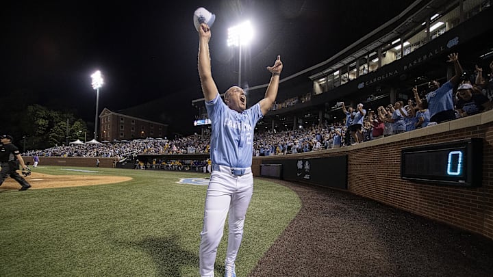 Jun 3, 2024; Chapel Hill, NC, USA; North Carolina Tar Heels Head Coach Scott Forbes (21) celebrates his team’s win over the Louisiana State Tigers in the Div. I NCAA baseball regional at Boshamer Stadium.  Mandatory Credit: Jeffrey Camarati-Imagn Images
