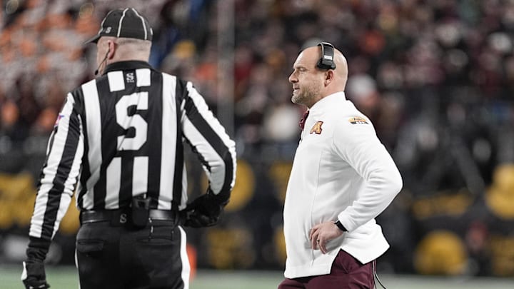 Jan 3, 2025; Charlotte, NC, USA; Minnesota Golden Gophers head coach P.J. Fleck during the first quarter against the Virginia Tech Hokies at the Dukes’ Mayo Bowl at Bank of America Stadium. Mandatory Credit: Jim Dedmon-Imagn Images Jan 3, 2025; Charlotte, NC, USA; Minnesota Golden Gophers head coach P.J. Fleck during the first quarter against the Virginia Tech Hokies at the Dukes’ Mayo Bowl at Bank of America Stadium. Mandatory Credit: Jim Dedmon-Imagn Images