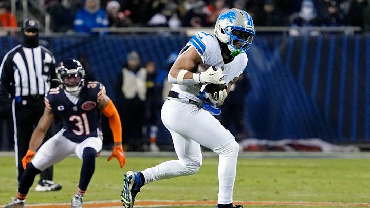 Jan 4, 2026; Chicago, Illinois, USA; Detroit Lions wide receiver Kalif Raymond (11) makes a catch against the Chicago Bears during the second half at Soldier Field. Mandatory Credit: David Banks-Imagn Images