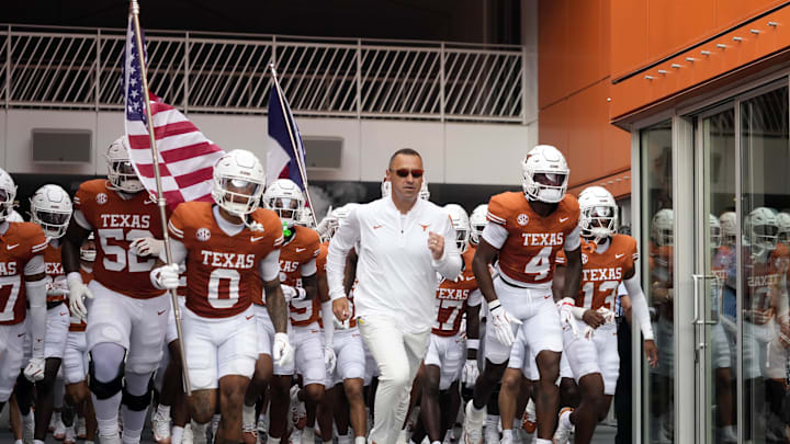 Texas Longhorns head coach Steve Sarkisian leads players on to the field before the game against the San Jose State Spartans at Darrell K Royal-Texas Memorial Stadium. Texas Longhorns head coach Steve Sarkisian leads players on to the field before the game against the San Jose State Spartans at Darrell K Royal-Texas Memorial Stadium.