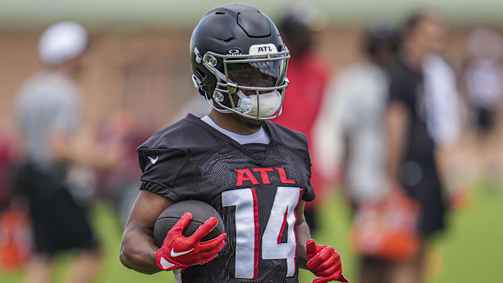 Jun 3, 2024; Atlanta, GA, USA; Atlanta Falcons wide receiver Rondale Moore (14) runs with the ball during Falcons OTA at the Falcons Training facility. Mandatory Credit: Dale Zanine-Imagn Images