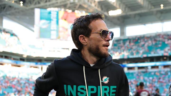 Dec 28, 2025; Miami Gardens, Florida, USA; Miami Dolphins head coach Mike McDaniel runs off the field following a win over the Tampa Bay Buccaneers at Hard Rock Stadium. Mandatory Credit: Sam Navarro-Imagn Images
