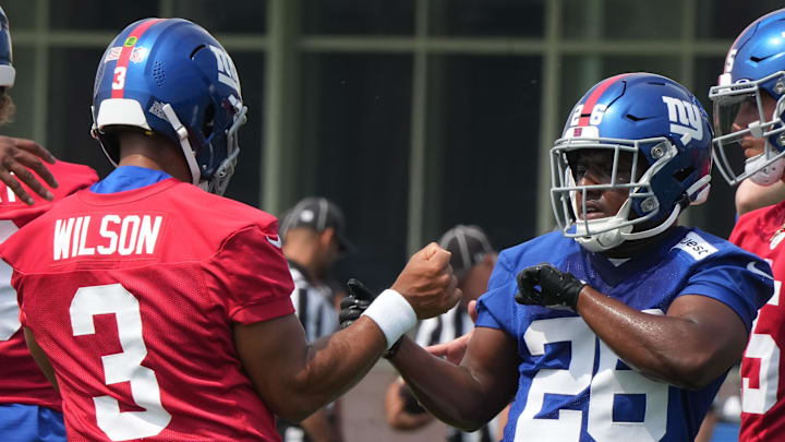 New York Giants QB Russell Wilson and running back Devin Singletary  
