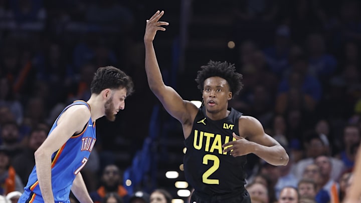 Mar 20, 2024; Oklahoma City, Oklahoma, USA; Utah Jazz guard Collin Sexton (2) celebrates after scoring a basket against the Oklahoma City Thunder during the second quarter at Paycom Center. Mandatory Credit: Alonzo Adams-Imagn Images