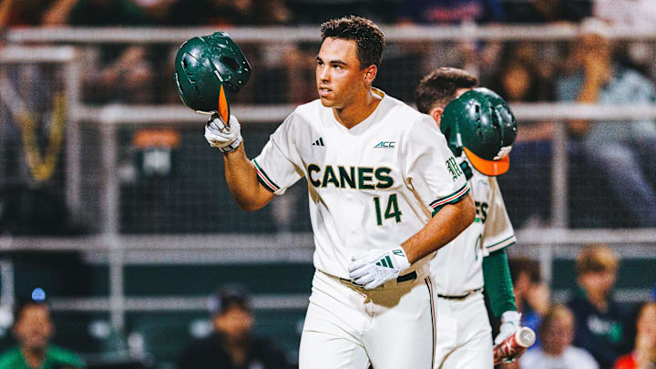Miami Hurricanes third baseman Daniel Cuvet launches a ball out of the park for a home run against Notre Dame. Miami Hurricanes third baseman Daniel Cuvet launches a ball out of the park for a home run against Notre Dame.