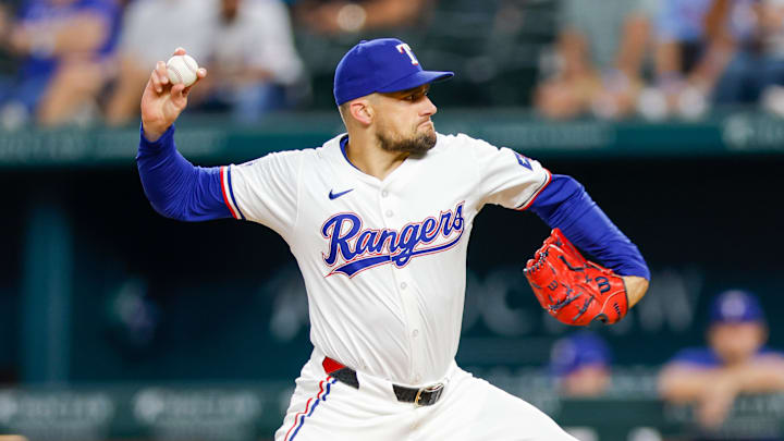 Texas Rangers pitcher Nathan Eovaldi throws during the first inning against the New York Yankees. Texas Rangers pitcher Nathan Eovaldi throws during the first inning against the New York Yankees.
