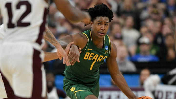 Wright, one of the top portal point guards, committed to BYU from Baylor.