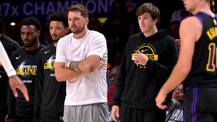 Apr 21, 2026; Los Angeles, California, USA; Los Angeles Lakers guard Luka Doncic (77) and guard Austin Reaves (15) look on from the bench during the second half of game two of the first round of the 2026 NBA Playoffs against the Houston Rockets at Crypto.com Arena. Mandatory Credit: Jayne Kamin-Oncea-Imagn Images