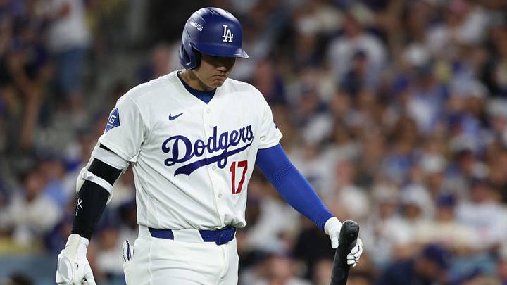 Oct 4, 2026; Los Angeles, California, USA;  Los Angeles Dodgers designated hitter Shohei Ohtani (17) reacts after striking out during the seventh inning against the Atlanta Braves in game two of the NLDS for the 2026 MLB Playoffs at Uniqlo Field at Dodger Stadium.  Mandatory Credit: Kiyoshi Mio-Imagn Images