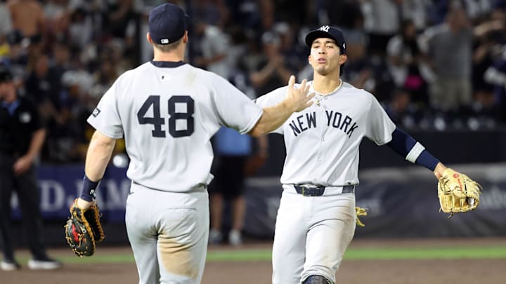Apr 17, 2025; St. Petersburg, Florida, USA;  New York Yankees third base Oswaldo Cabrera (95) and first base Paul Goldschmidt (48) celebrate after they beat the Tampa Bay Rays at George M. Steinbrenner Field.