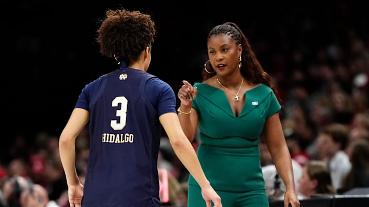 Notre Dame Fighting Irish head coach Niele Ivey talks to guard Hannah Hidalgo (3) during the NCAA women's basketball tournament second round game against the Ohio State Buckeyes at the Jerome Schottenstein Center in Columbus on March 23, 2026.