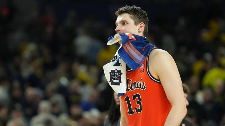 Apr 4, 2026; Indianapolis, IN, USA; Illinois Fighting Illini center Tomislav Ivisic (13) reacts after losing to the Connecticut Huskies during a semifinal of the Final Four of the men's 2026 NCAA Tournament at Lucas Oil Stadium. Mandatory Credit: Robert Deutsch-Imagn Images Apr 4, 2026; Indianapolis, IN, USA; Illinois Fighting Illini center Tomislav Ivisic (13) reacts after losing to the Connecticut Huskies during a semifinal of the Final Four of the men's 2026 NCAA Tournament at Lucas Oil Stadium. Mandatory Credit: Robert Deutsch-Imagn Images